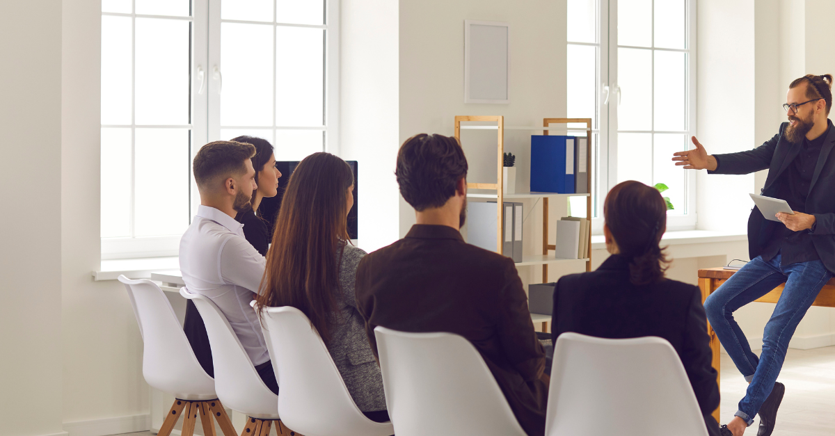 business team meeting in office discussing digital marketing and web development strategies